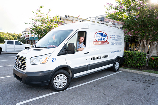 Modern Air commercial service technician in truck