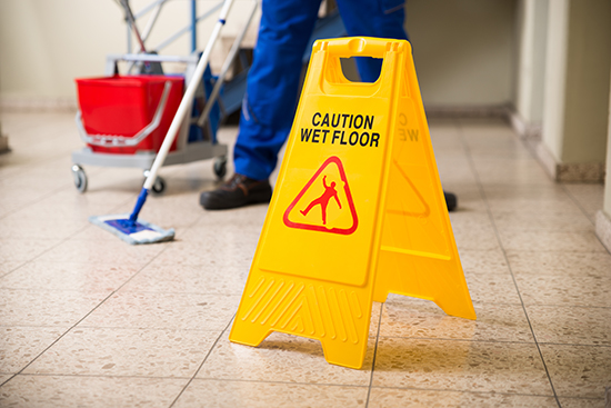 mopping wet restaurant floor