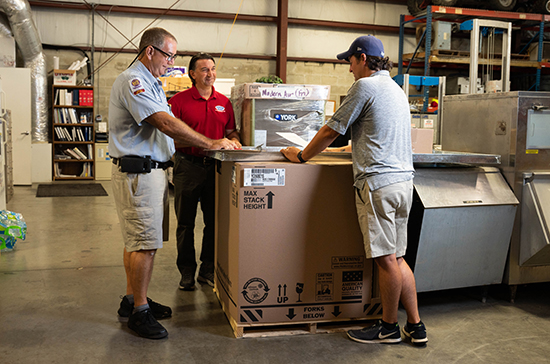 new commercial ac unit being prepared for delivery